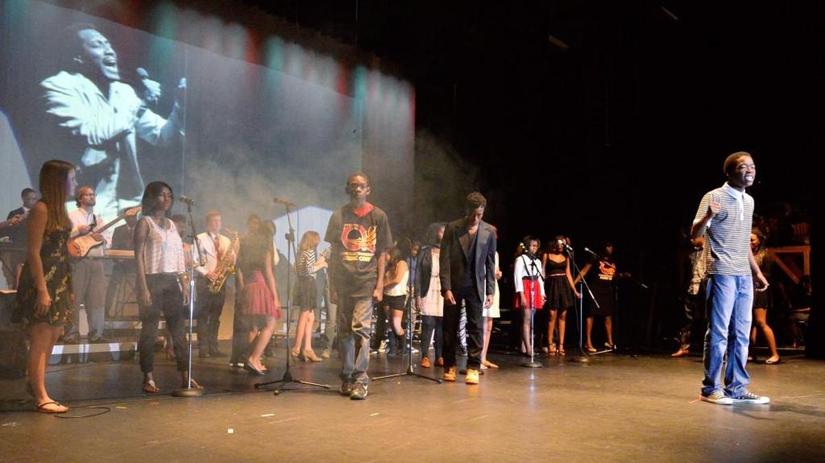 Malique Williams performs a spoken word tribute to Otis Redding during the Otis Redding Foundation performance for The Big “O” Singer/Songwriter Music Camp in 2014.