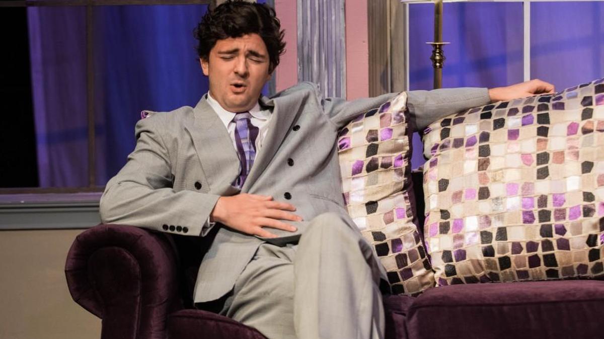 Daniel Osgood (Tito) sits down as he begins to feel sick during his talk with Matt Astin (Saunders) during a rehearsal of Theatre Macon’s production of “Lend Me a Tenor.”.