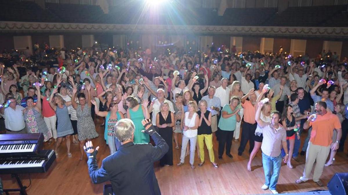 People enjoy the music at a previous year’s Summer’s Night Picnic and Dance.