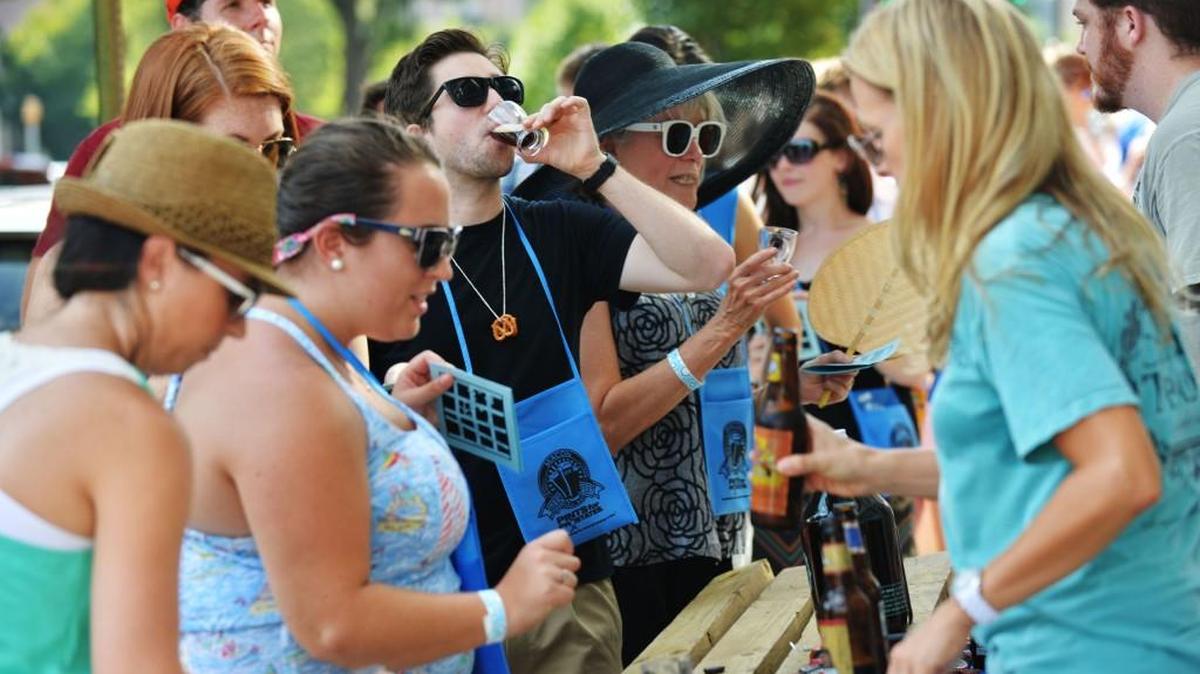 Beer aficionados and novices alike lined up for a taste of different brews during the 2014 Macon Beer Festival.