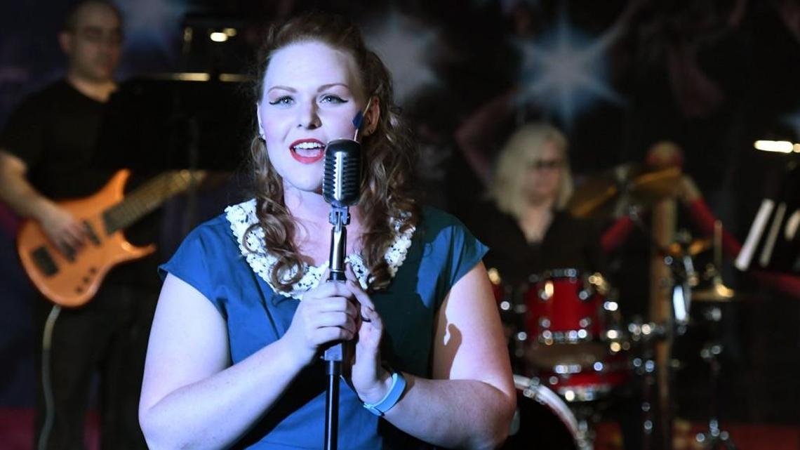 Jamey Figureoa sings in Macon Little Theatre’s production of “Blame it on the Movies.”