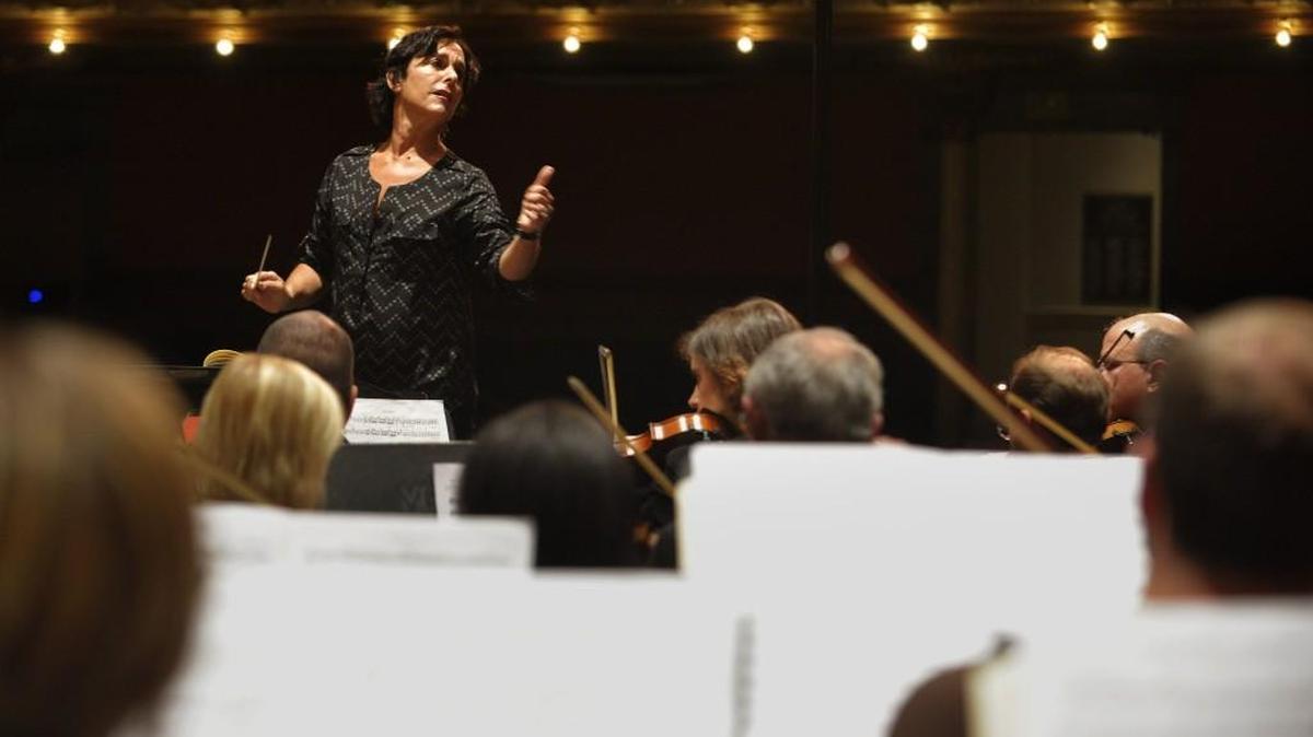 Conductor Janna Hymes leads the Macon Symphony Orchestra last month before its season opening performance. The symphony is scheduled to close in October.