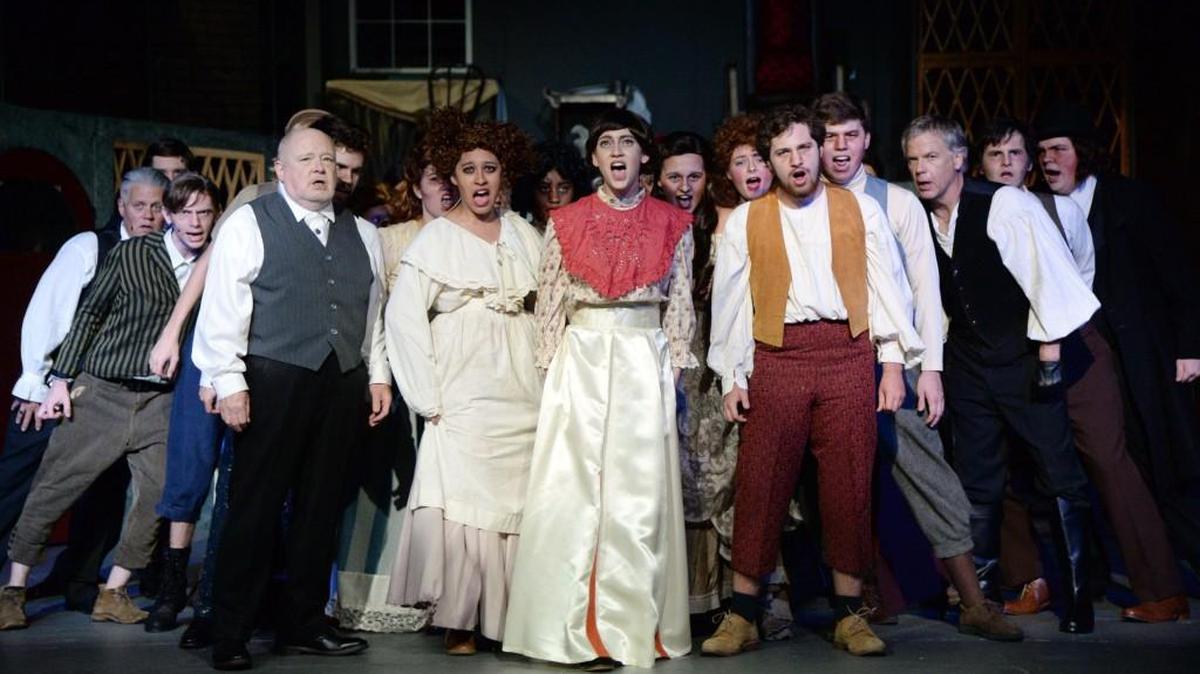 The chorus performs in Macon Little Theatre’s production of “Sweeney Todd.”