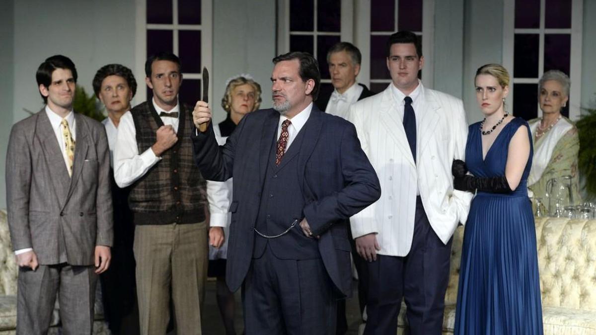 From left, Mark Bower, Patsy Seymour, Cliff Skelton, Peg Jones, Kendall Countryman, Jay Kramer, Jack Henson, Brooke Woodard and Paige Henson rehearse a scene from Macon Little Theatre’s production of “And Then There Were None.”