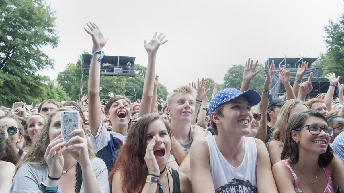 Fans of singer Melanie Martinez sing along with the artist on Sunday afternoon at Music Midtown in Atlanta.