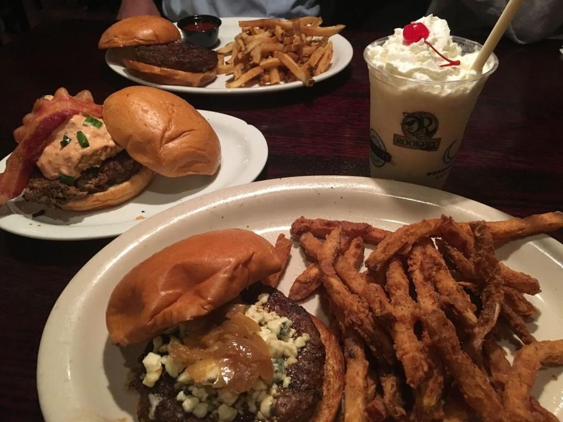 Among the options at the Rookery are, clockwise from bottom, James Brown bruger with battered fries and a Cherry Street shake, the Walden Greenback burger and the Rookery Burger with hand-cut fries