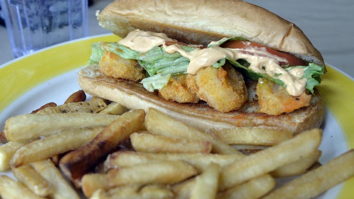Local Yolkal Cafe in Milledgeville is open for breakfast, lunch and brunch, and among its menu offerings is a shrimp po boy sandwich with fries.