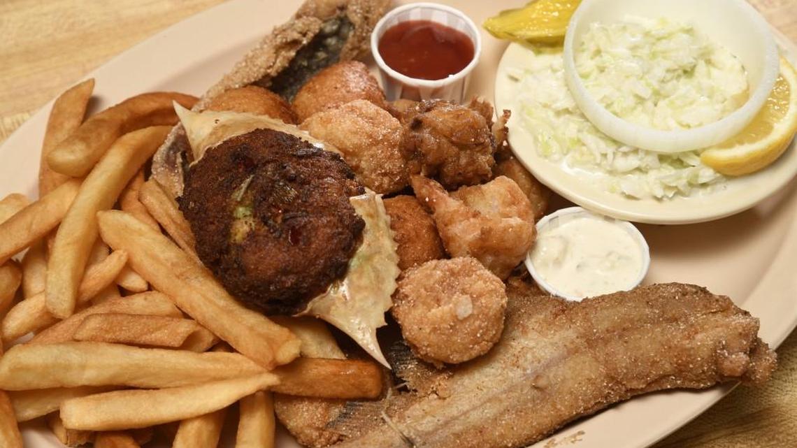 The seafood platter at Snellgrove Seafood includes catfish, trout, deviled crab, shrimp, oysters and scallops.
