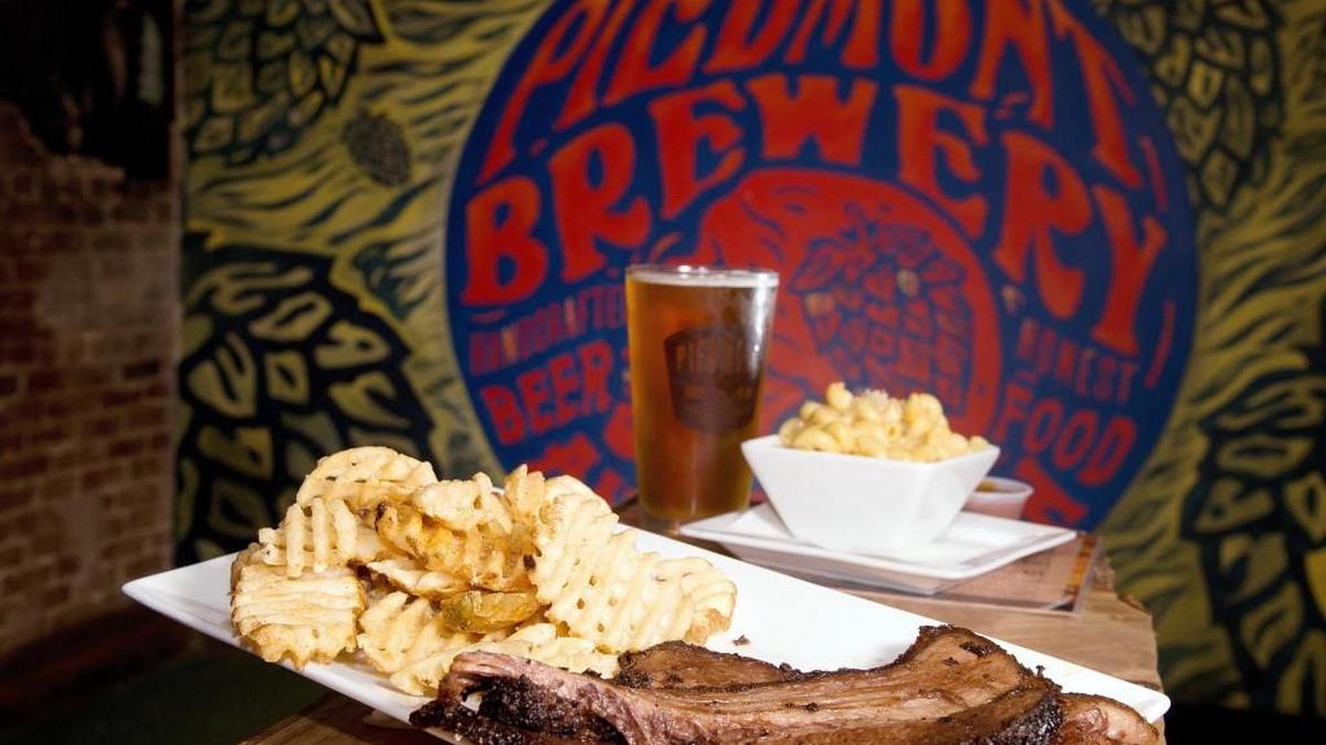 Smoked brisket with waffle fries and mac ‘n’ cheese along with a Heart of Gold Blonde Ale at Piedmont Brewery & Kitchen.