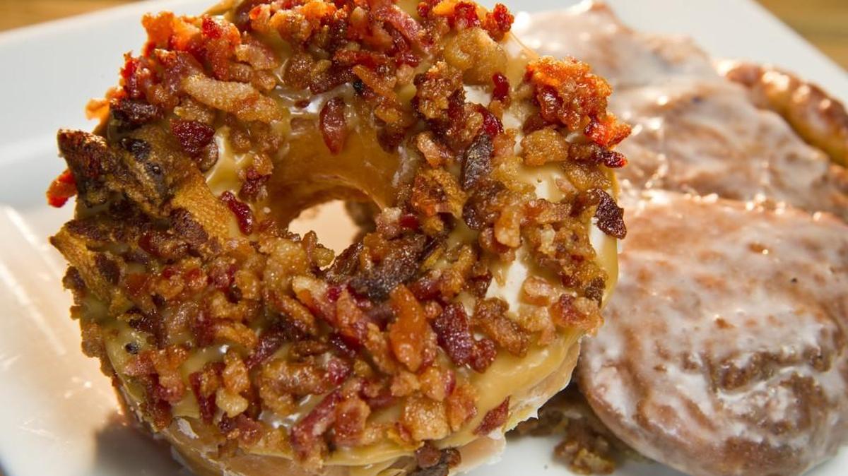 A maple bacon donut and apple fritter are among the baked goods you might find on any given day at Tommy’s.