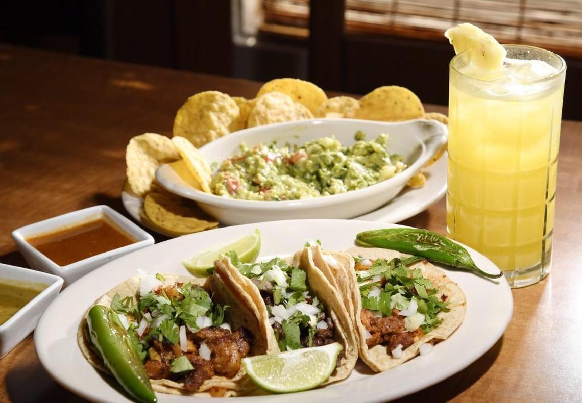 Tacos from La Bella Morelia with guacamole and aguas frescas.