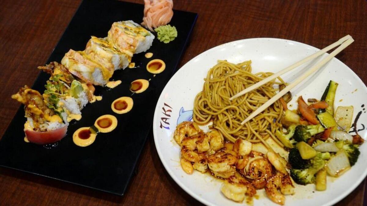 Hibachi shrimp dinner with rice, noodles and vegetables and a Spiderman sushi are among the options at Taki Japanese Steakhouse.