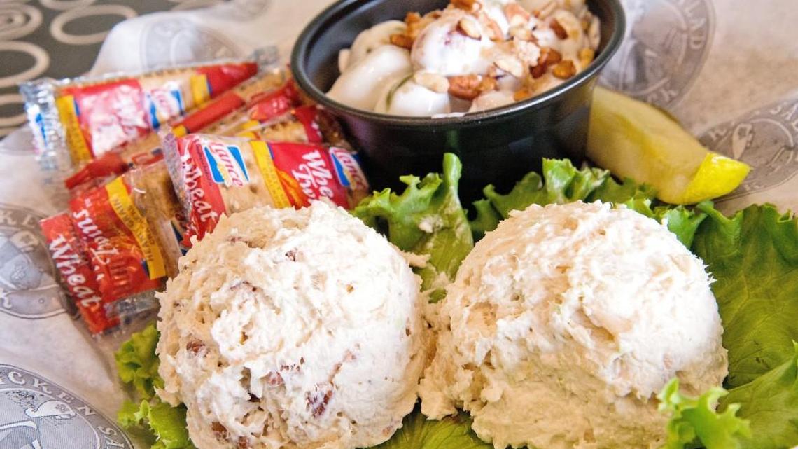 With the Chick Trio at Chicken Salad Chick in Warner Robins, diners can choose three chicken salads or sides. This version features Nutty Nana, Mimi’s Mix and sweet grape salad.