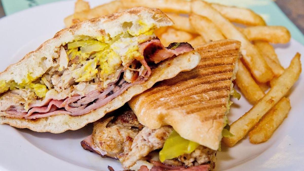Pork and ham Cuban sandwich with french fries are among the menu options at Bigo’s Bistro in Warner Robins.