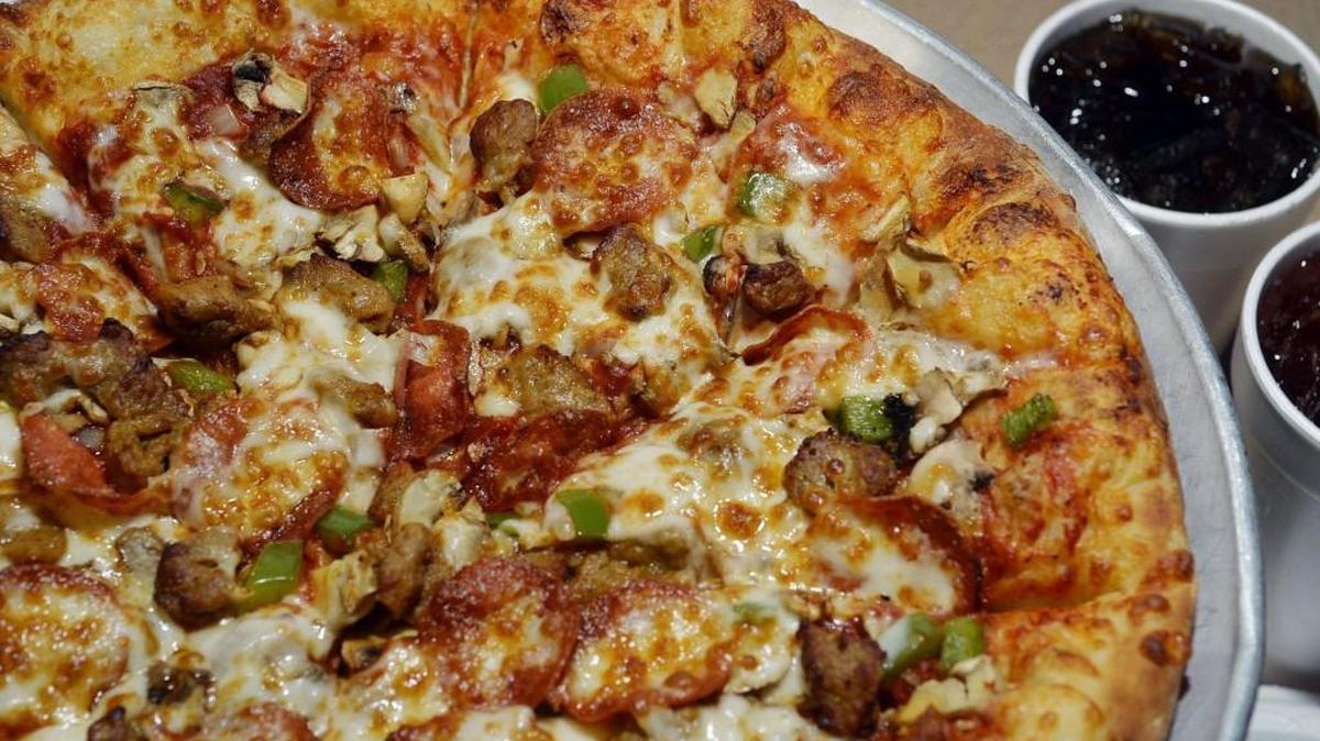 Try the large, deluxe pizza with hand thrown crust at Stoner’s Pizza Joint in Macon.