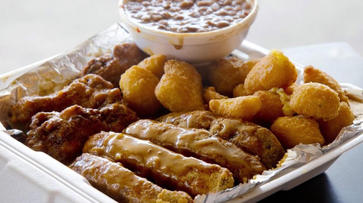 Hog wings (fried ribs), chicken wings, corn nuggets and baked beans are among the menu items at Tays’ Wings in Warner Robins.