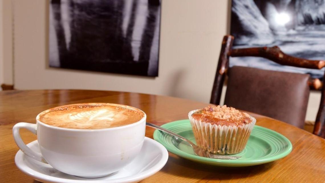 Small latte and blueberry muffin at Taste and See Coffee Shop and Gallery.