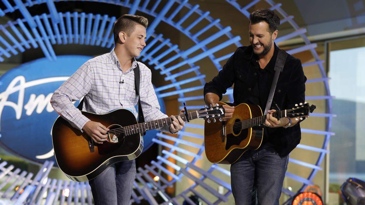 15-year old, Ethan Payne from Mary Persons High School, plays guitar alongside Luke Bryan on the set of American Idol