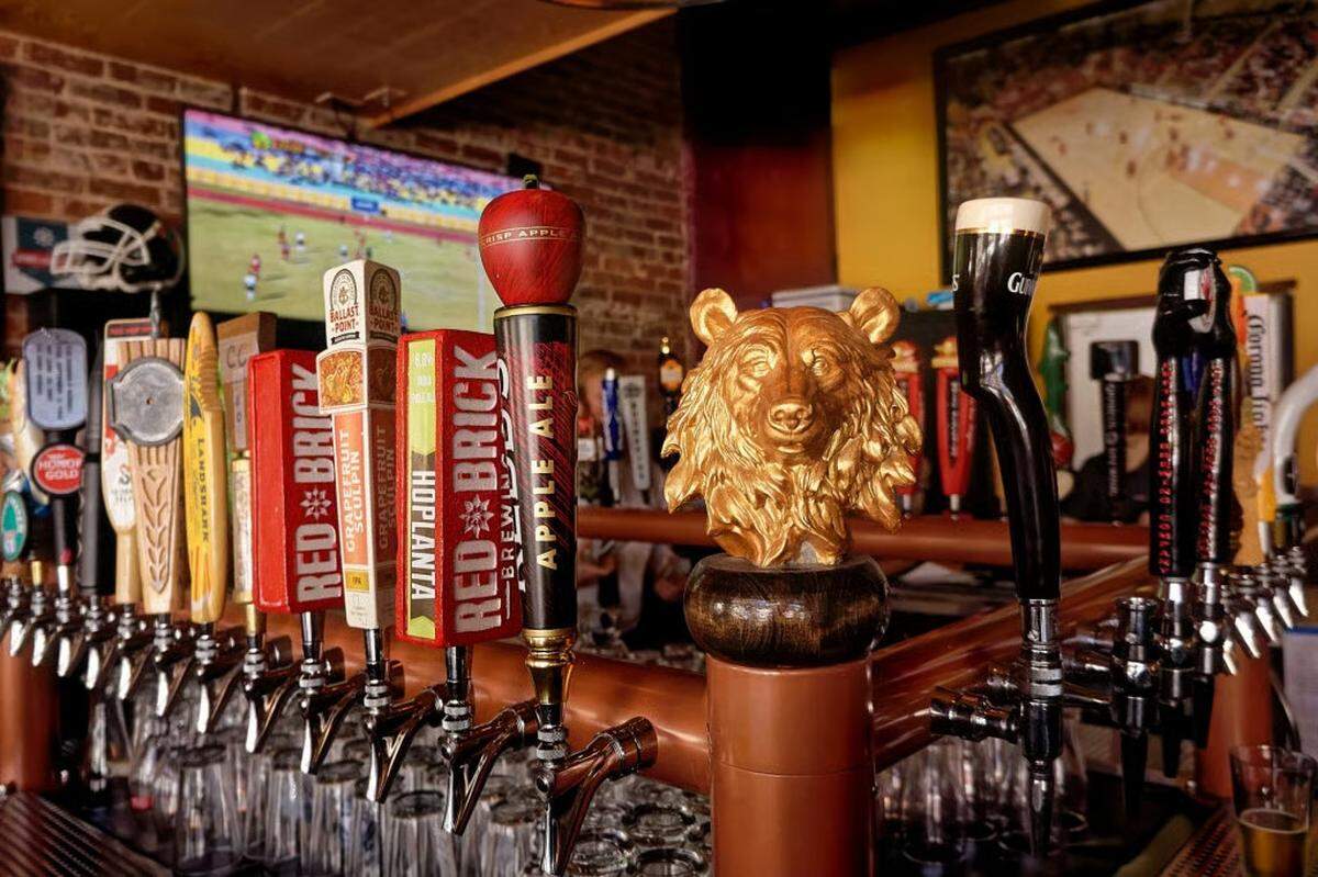 Beer taps at the Bearfoot Tavern before a catastrophic roof collapse temporarily closed the popular gastropub. The pub is now undergoing an interior remodel before its reopening.
