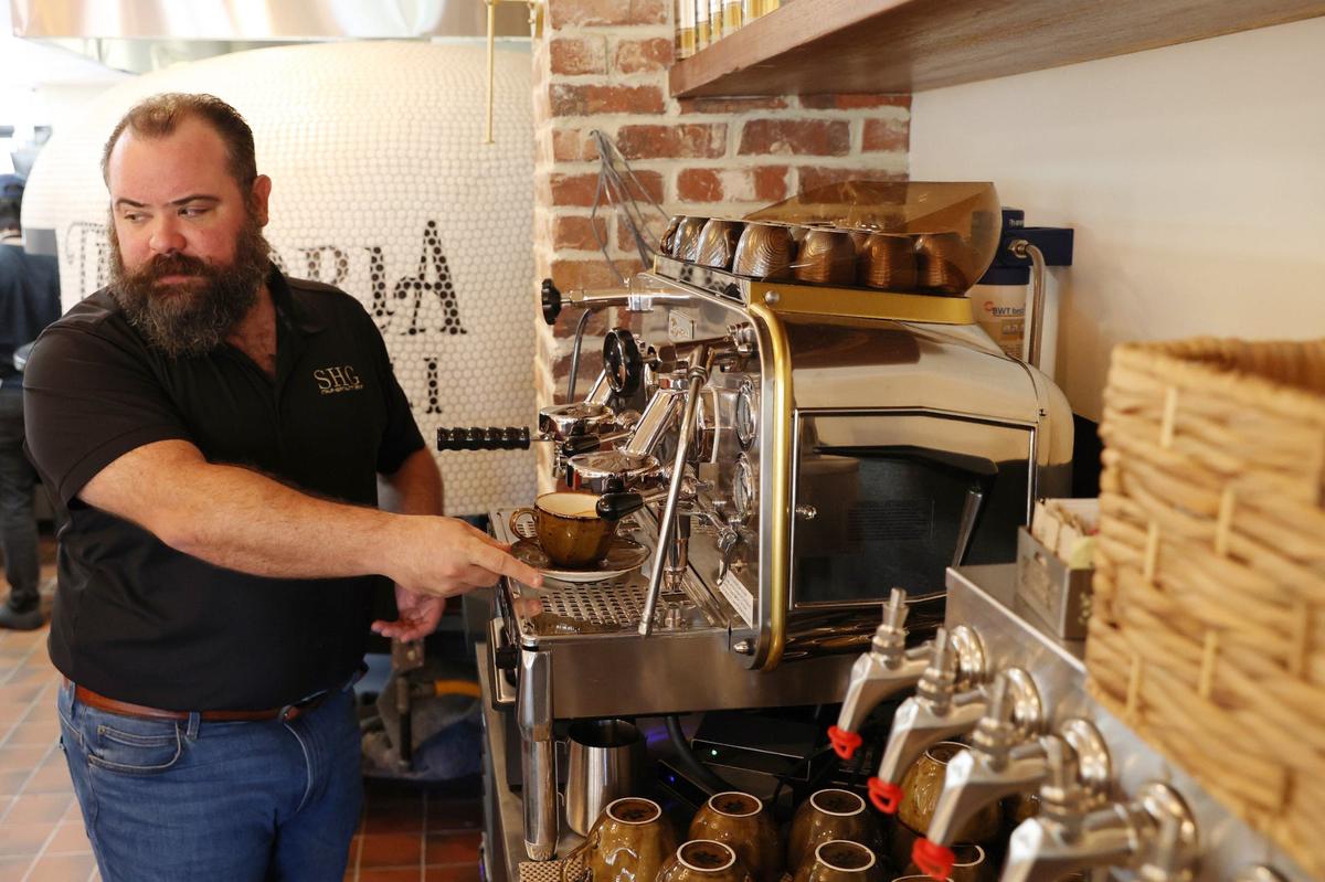 Trattoria di Napoli proprietor John Staurulakis makes an espresso at the machine in new Italian restaurant Trattoria di Napoli on Wednesday, Aug. 7, 2024, in downtown Perry, Georgia. Staurulakis has worked in the restaurant industry for most of his life, but soon will open Trattoria di Napoli as his first restaurant.