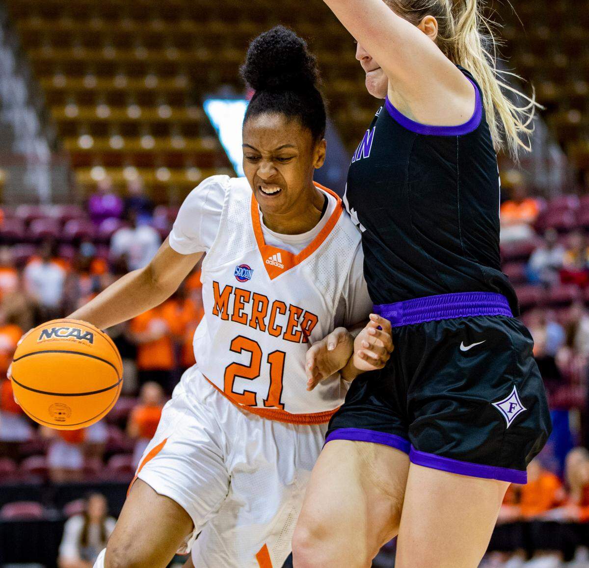 Mercer graduate student guard Shannon Titus drives to the net against Furman Saturday afternoon in the SoCon Ingles Basketball Championships at the Harrah’s Cherokee Center in Asheville, N.C.
