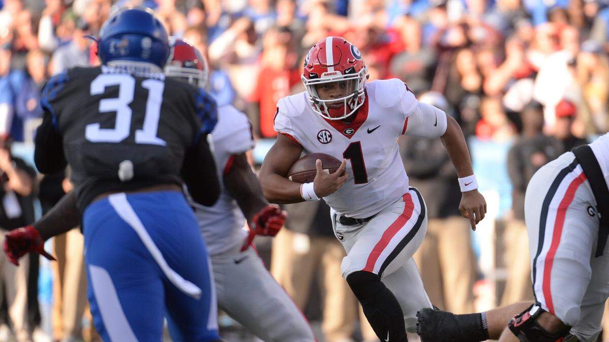UGA QB Justin Fields runs the ball during the second quarter of  the UK-Georgia football game at Kroger Field in Lexington, KY on Saturday, November 3, 2018.
