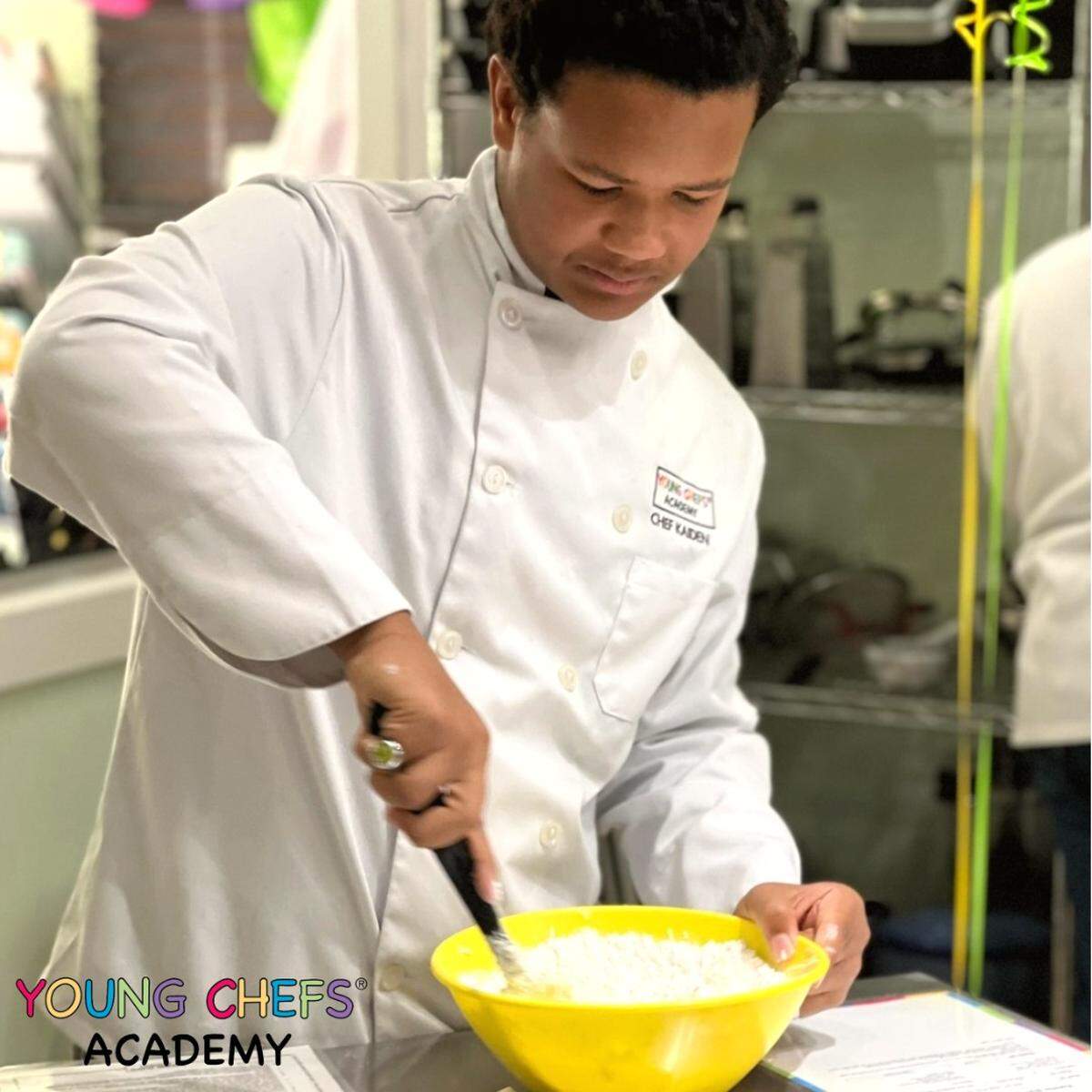 A senior chef at a Young Chefs Academy.