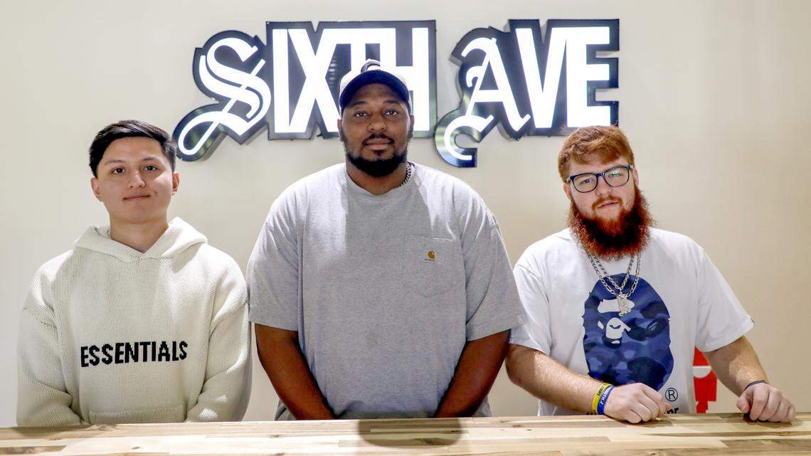 From left, the owners of Sixth Ave at 482 First St. in downtown Macon: Michael Paredes, managing director; Marquis Burns, creative director; and Jarredd Helms, director of operations.