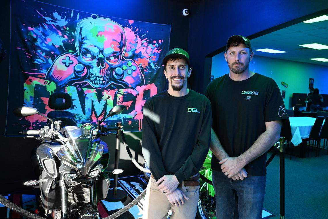 Disconnect Gaming Lounge owners Adam Edwards (left) and Jay Wilson pose for a portrait ahead of the opening of the new gaming lounge in Warner Robins. The gaming lounge features Playstation, Xbox and Nintendo consoles for kids and adults to game on.