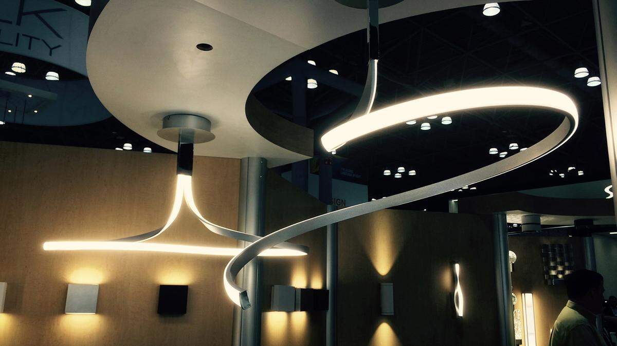 LED light fixtures float and glow with sculptural charm.