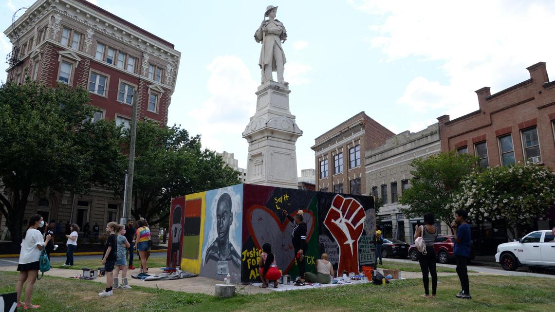 Macon artists install mural around Confederate monument on Cotton Avenue