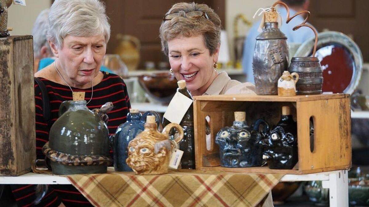 Browsers at last year’s “Fired Works” exhibit and sale enjoyed the show’s functional, decorative and quirky work available for viewing and purchasing from southeastern potters.