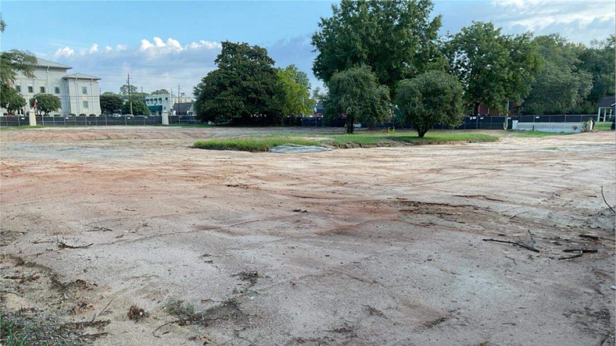 The former site of the New Perry Hotel is under new ownership.