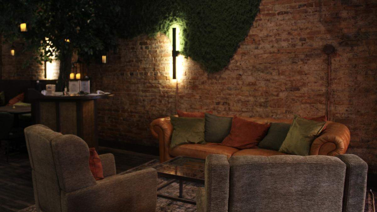 Couches and chairs sit in the front waiting area of Parish on Cherry, at 580 Cherry St. in Macon, Georgia. 