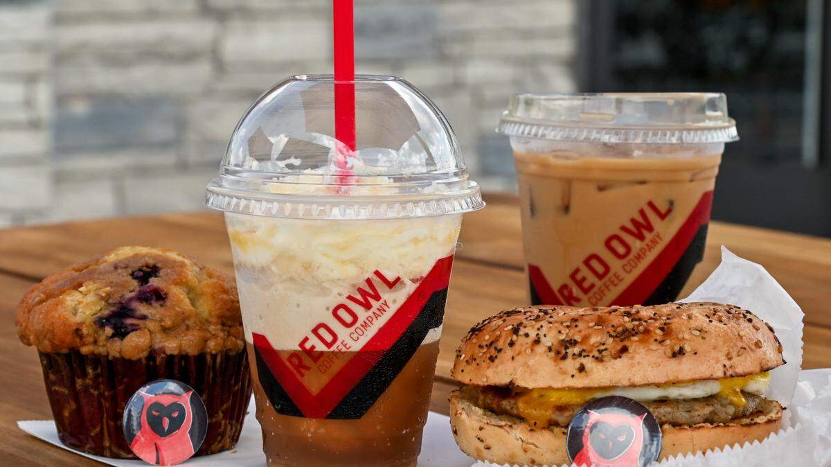 White mocha guilt free frappe and Dosta Double with sausage, egg and cheese Bowser Bagel and blueberry muffin at Red Owl Coffee Company in Macon.