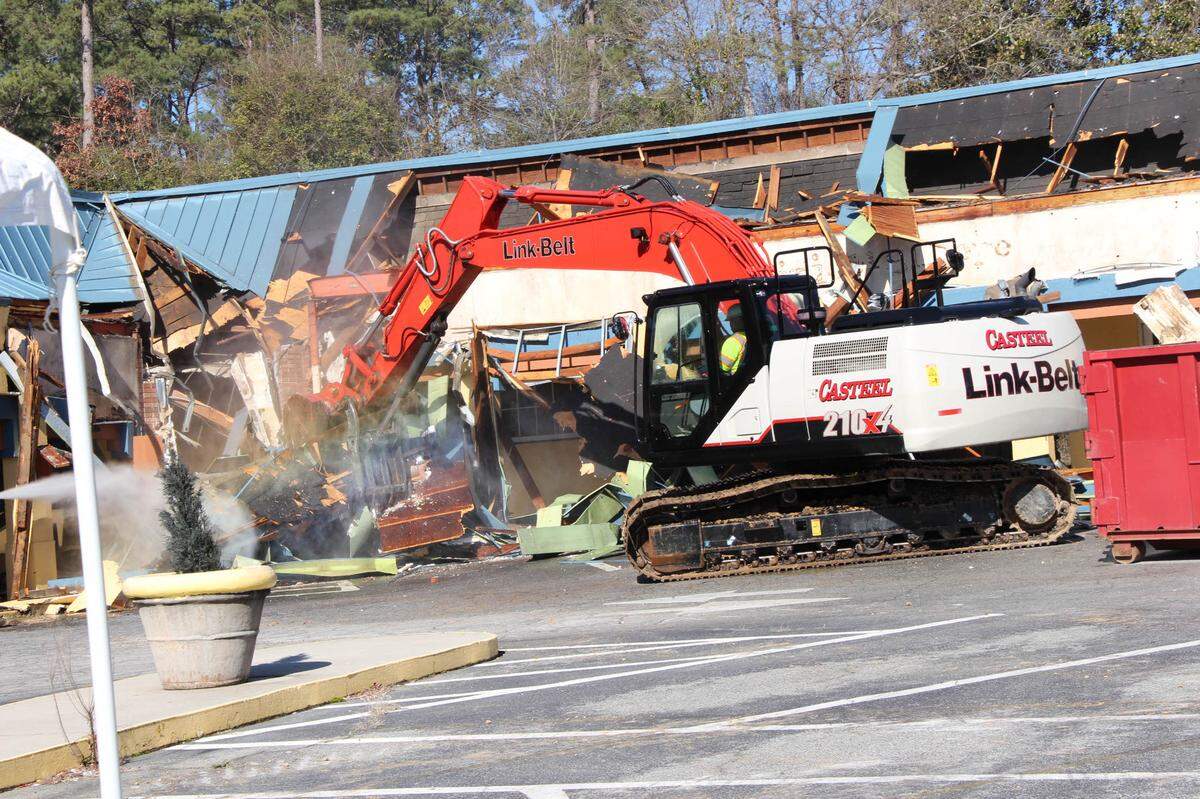 Demolition of the old Riverside Plaza took place on Wednesday to begin construction on the new River Edge Behavioral Health Complex.