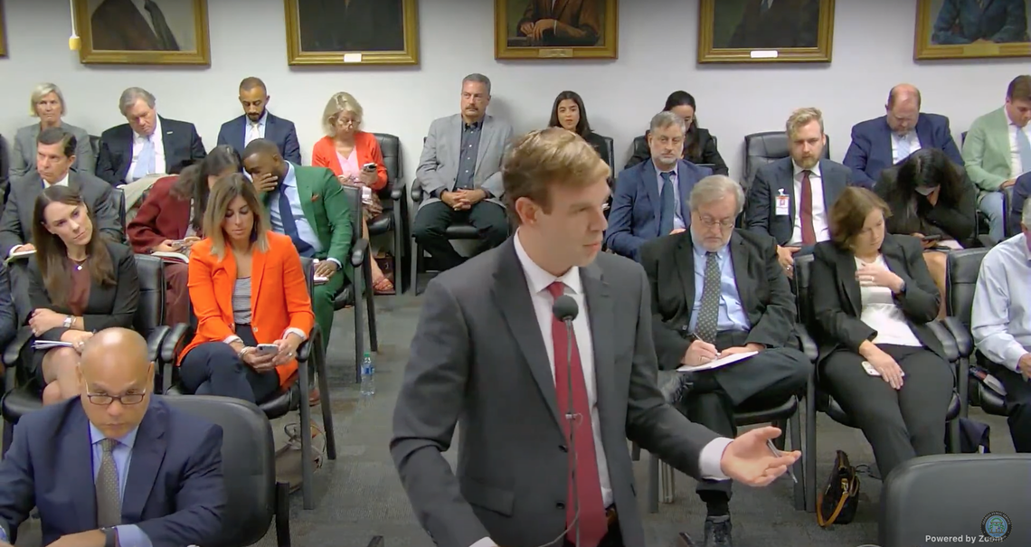 Public Service Commission staff attorney Preston Thomas grills Georgia Power CEO Chris Womack at a hearing on Tuesday, September 27