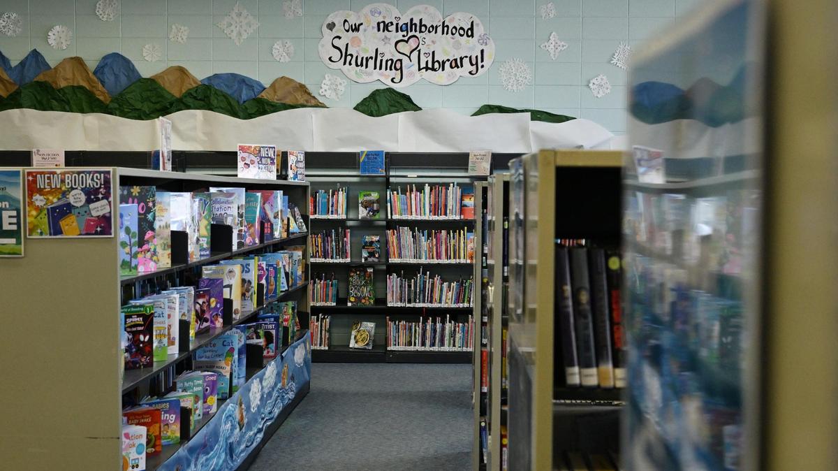 Children’s books line the shelves inside of the inside a library in this file photo.