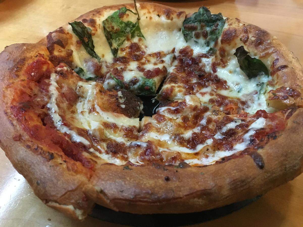 The Mother Clucker at Fatty’s Pizza is topped with chicken, bacon and a drizzle of ranch dressing.