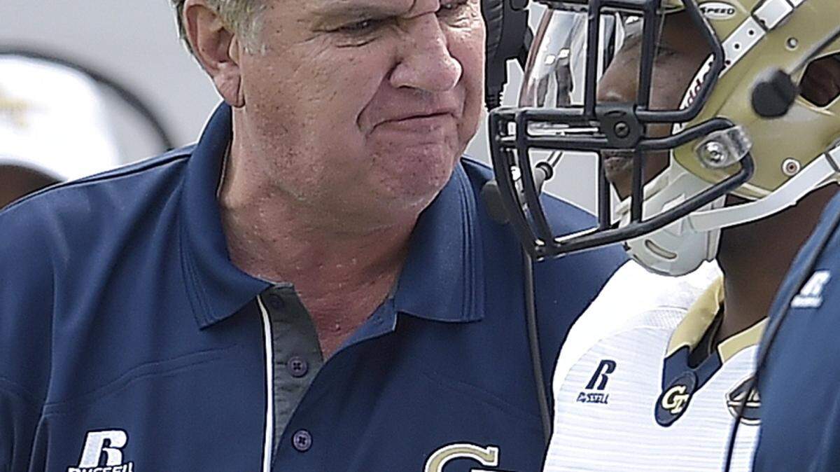 Georgia Tech head coach Paul Johnson speaks to a player on the sideline against Tulane during the first half of an NCAA college football game, Saturday, Sept. 12, 2015, in Atlanta. (AP Photo/Mike Stewart)