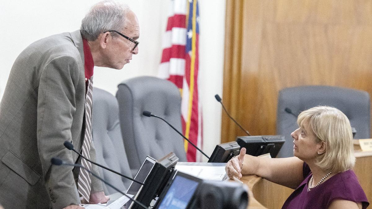 Anita Barkin with the Georgia Department of Public Health speaks with Macon-Bibb County Commissioner Larry Schlesinger on June 29 prior to a Macon-Bibb County Operations and Finance Committee called meeting.
