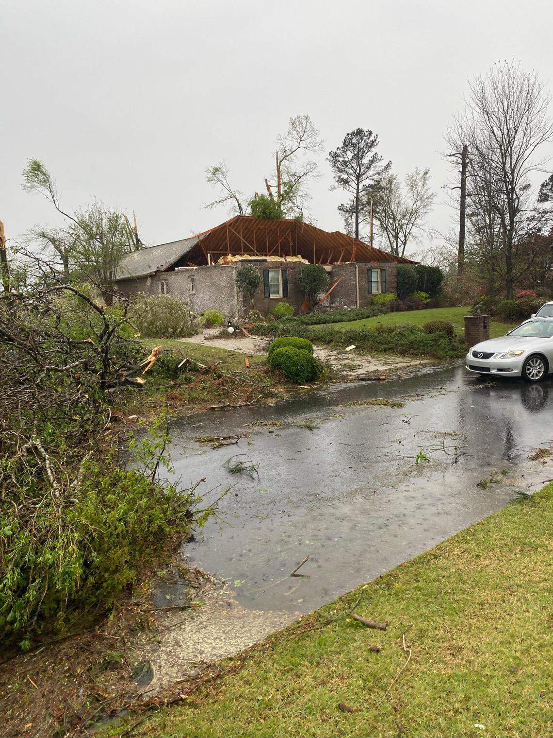 A severe storm system moved through Middle Georgia Tuesday afternoon, damaging houses and power lines, including this Stathams Landing House in Houston County.