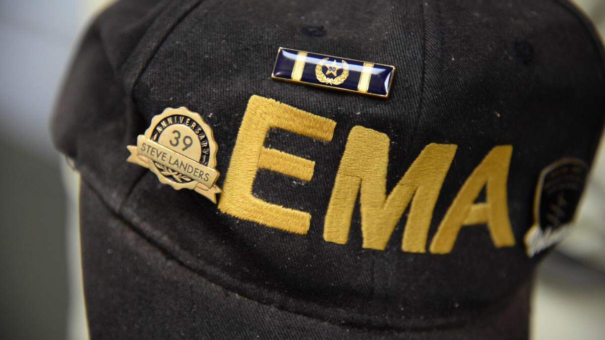 Steve Landers’ hat has a 50 year pin on it for his 50 years of service to the Macon-Bibb County Emergency Management Agency.