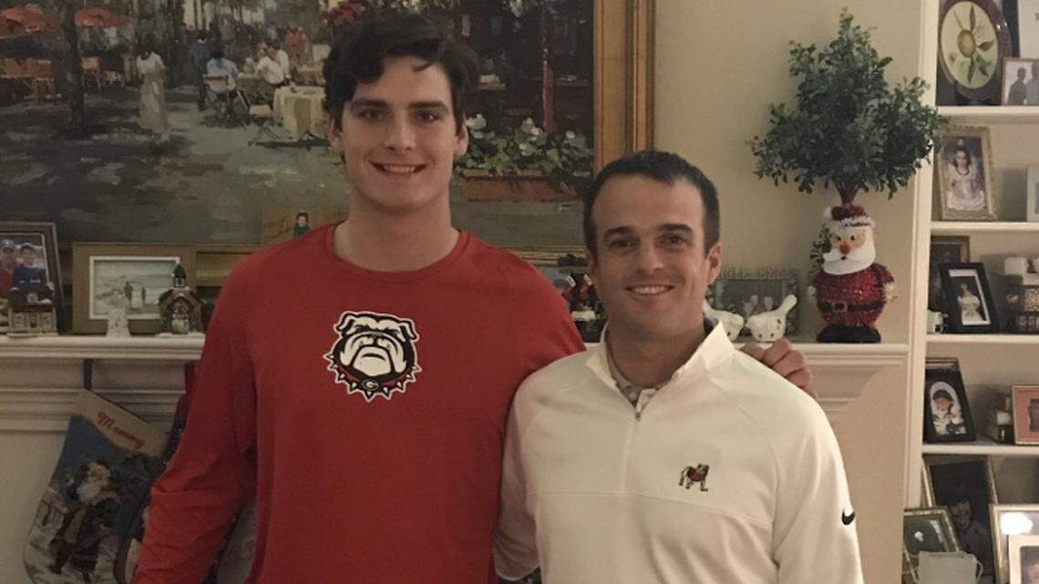 John FitzPatrick poses for a photo with tight ends coach Shane Beamer.