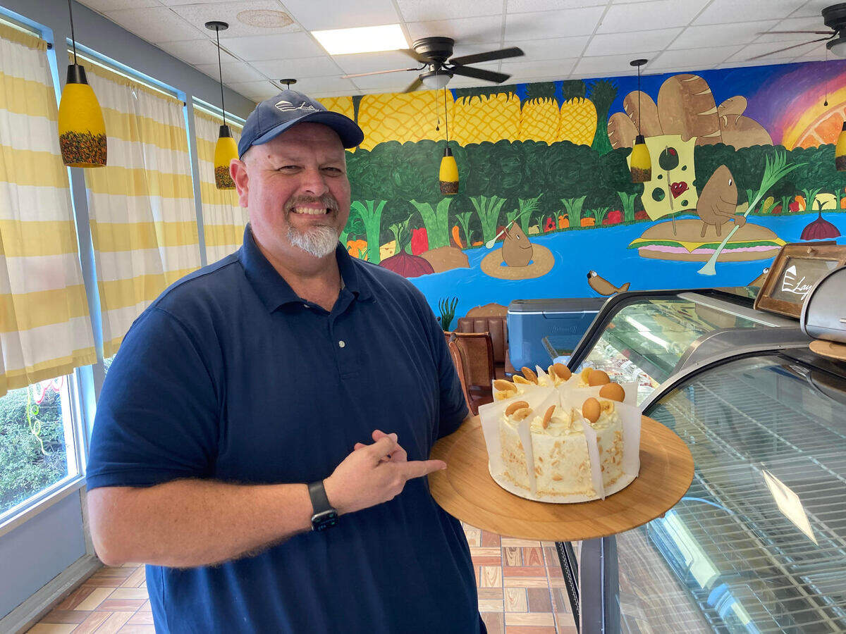 Steven Collins, co-owner of Layers at 3001 Vineville Ave., with their banana pudding cake.