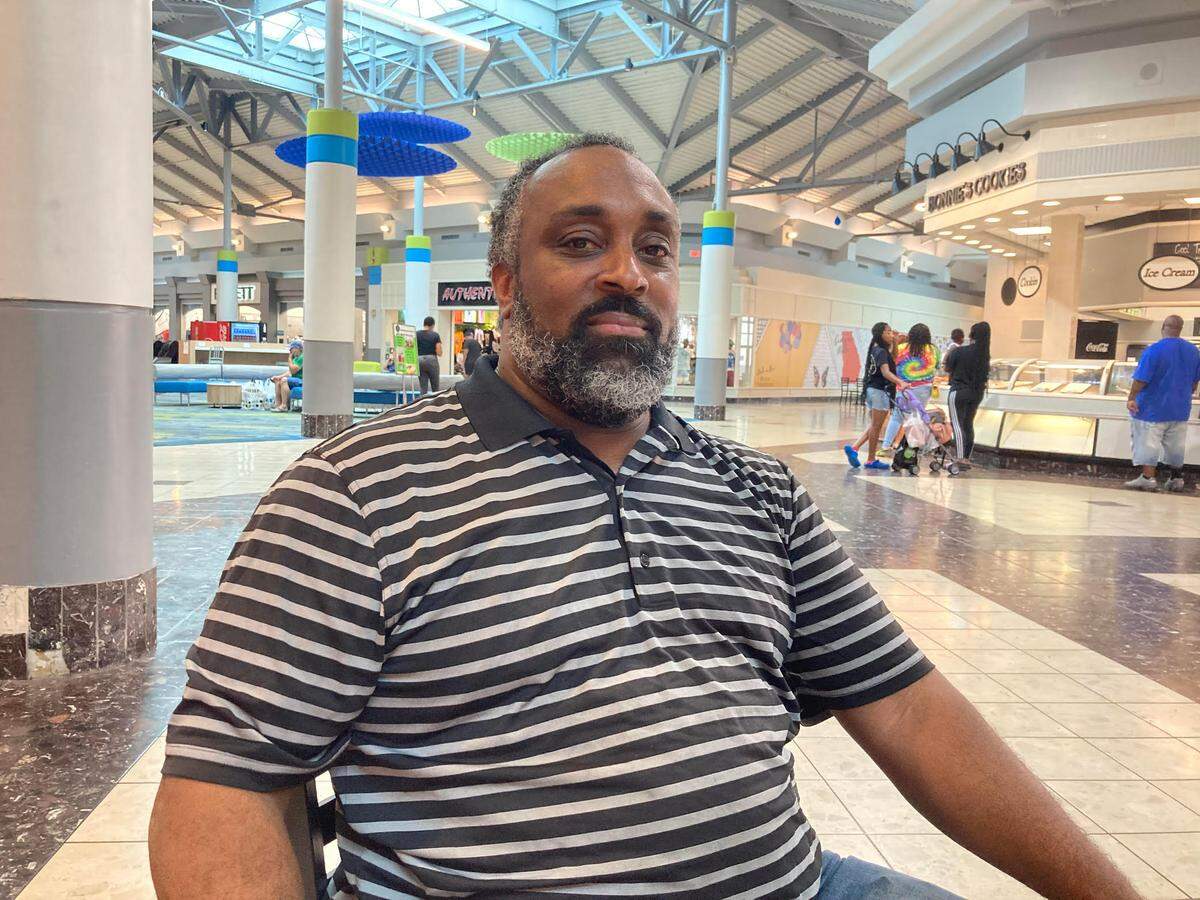 Leonard “LC” Ashford Jr. talks about plans for he and his wife’s Cluck N Waffle restaurant. He’s pictured in the food court at the Houston County Gallery near The Georgia Dog, their gourmet hot dog, walk-up restaurant. The Georgia Dog moved into the former Chick-fil-A space.