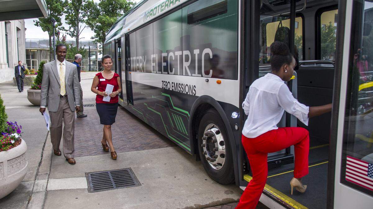 People board a Proterra electric bus at Terminal Station for a short demonstration ride on July 6, 2015. A bus by BYD, or Build Your Dreams, will be in Macon next week.