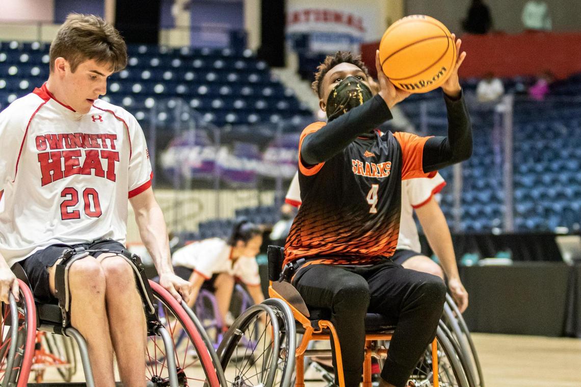 Houston County’s Ger’mir Gordon (4) shoots against the Gwinnett Heat in the GHSA Championship March 13.