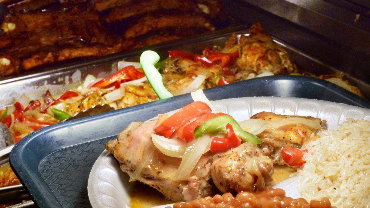 JASON VORHEES/THE TELEGRAPHBaked chicken, rice and baked beans are among the possible menu options at Liz's Southern Cooking in Warner Robins.