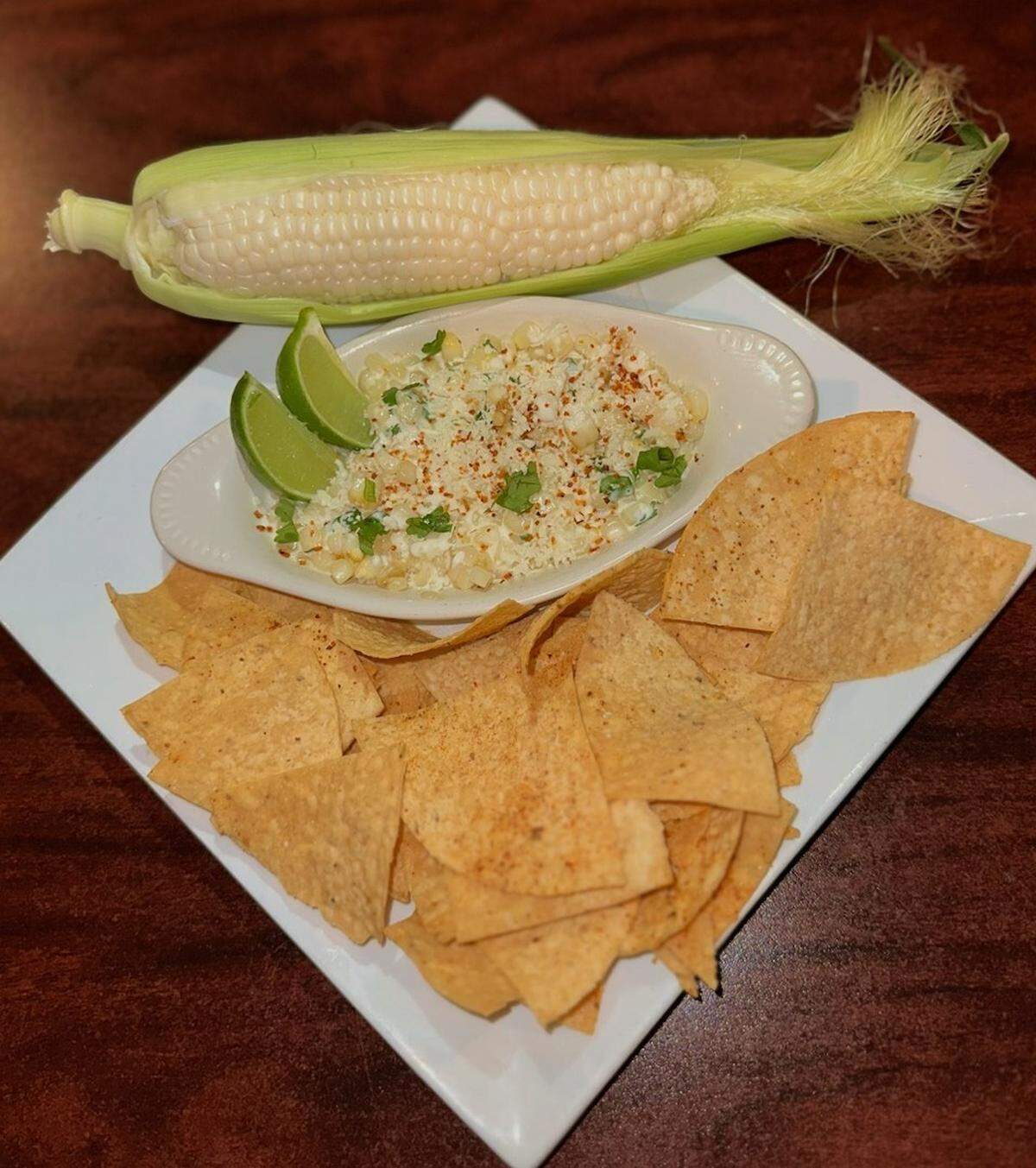 A farm-to-table Mexican street corn dip with fresh corn from Everett Farms is featured at 20’s Pub.